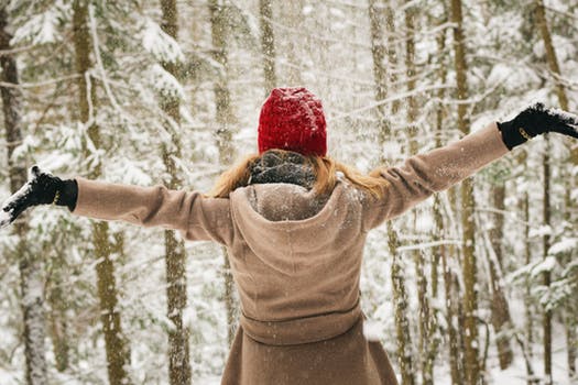 Woman in Falling Snow