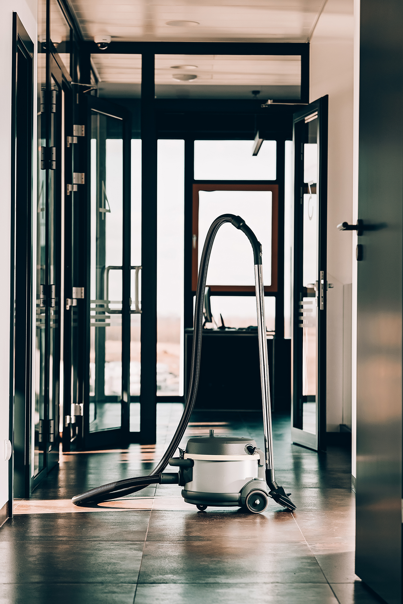 Janitorial service Janitorial service. Professional vacuum cleaning at the office